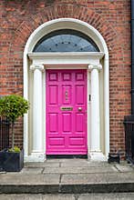 Pink classic door in Dublin, example of georgian typical architecture of Dublin Ireland