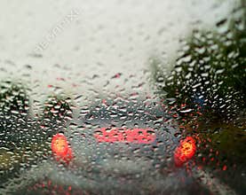 Raindrops on the glass of the car