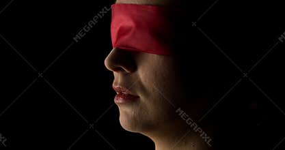 Woman with red eyes band