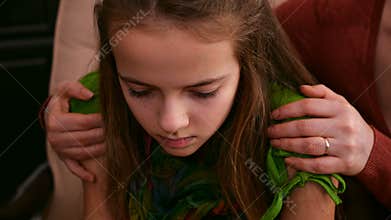 Woman hands hug worried and sad girl offering support