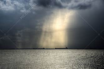 Lights over boats in Pacific Ocean