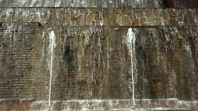 Waterfall and Brick Wall