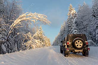 Jeep Wrangler Jk on winter road in Leningrad region
