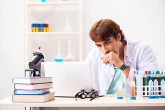 The young chemist working in the lab