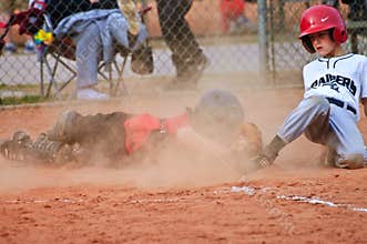 Sliding Into Home/ Boys Baseball