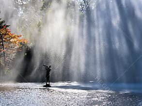 Refractions of Sunlight Through A Fountain