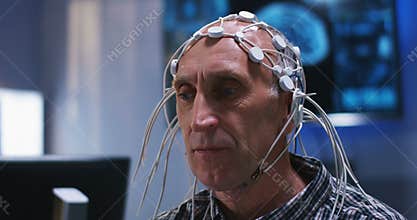 Patient answering doctors questions during brain scan