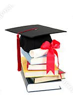 Graduation cap and diploma on stack of books