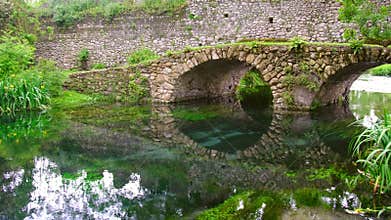 Fantasy bridge 4k stone arched reflection kingdom medieval river canal garden