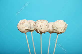 Birthday food - cake pop. White chocolate sweets on stick
