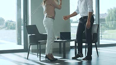 Partners having business meeting. Man and woman talking in luxury house.