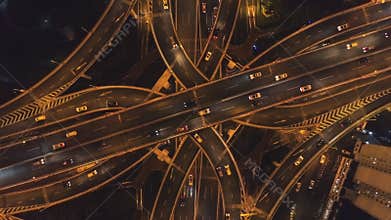 Complex Road Junction at Night. Shanghai City. China. Aerial Vertical Top-Down View