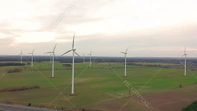 Windmill Wind power technology - Aerial drone view on Wind Power, Turbine, Windmill, Energy Production - Green