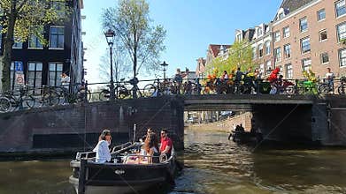Amsterdam, Netherlands. 25.04.2019. View from a tourist boat on seven bridges. Bridges of Amsterdam from the tourist