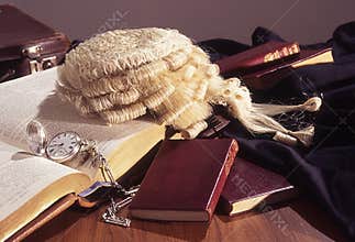 Still life of legal paraphenalia on lawyer`s desk