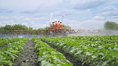 Agriculture fertilizer pesticide spraying. Fertilizing plants. Farm agriculture