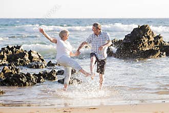 Lovely senior mature couple on their 60s or 70s retired walking