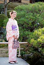 Caucasian girl wearing a kimono