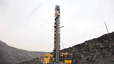 Drilling rig in the coal open pit