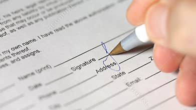 Signing of the document close up