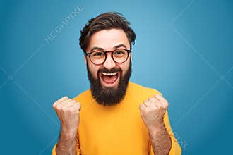 Excited man with fists up