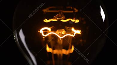 Light bulb on black background