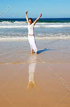 Happy beach holiday woman