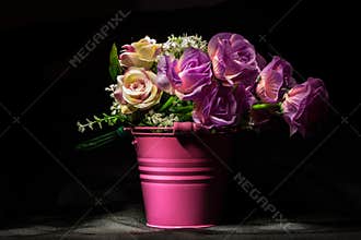 Pink roses in pink vase