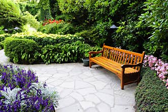 Wooden bench in Butchart Garden