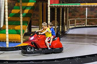 Children on bumper car