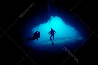Divers in cave