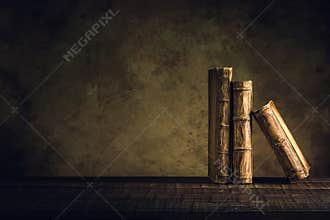 Old books vintage on wood floor and paper aged background or tex