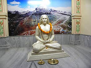 Varanasi, Uttar Pradesh, India - November 1, 2009 White color stone statue of Mahavatar Babaji at Babaji Cave temple, Kashi