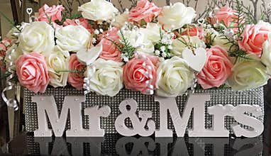 Wedding table floral oasis covered in glitter with mr & mrs