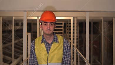 Shaking Head to Reject, No by Worker or Engineer or architect on construction site