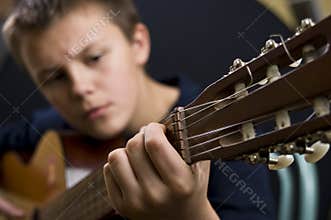 Boy playing guitar