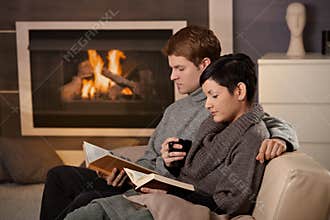 Couple hugging home