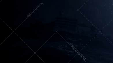 Alcatraz prison under a big storm at night