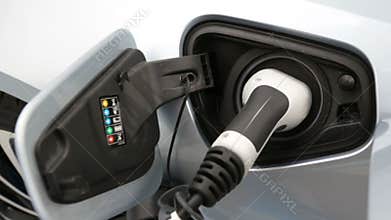 Electric car being charged