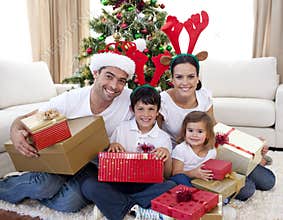 Happy family celebrating Christmas at home