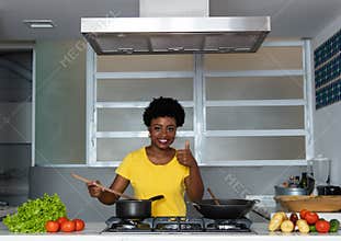 African american woman cooking at kitchen