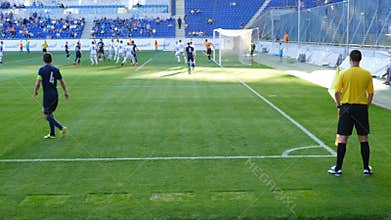 Football match, player take a corner