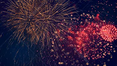 Red firework bursts. Big firecracker bursts in the sky during celebration.