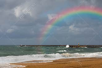 Rainbow on the beach of Anglet after the storm