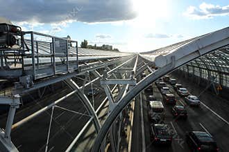 Cars on the road in the sound-absorbing tunnel.