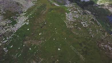 Horseback riding in the high mountain countryside. Clip. Top view of people on horseback in the highlands