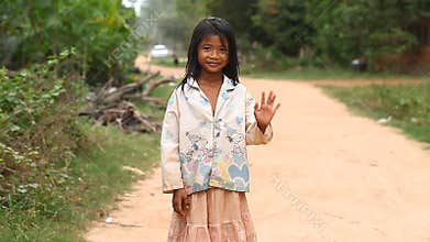 Siam Reap, Cambodia - January 13, 2017: Video portrait of a little Cambodian girl . Children from poor villages and