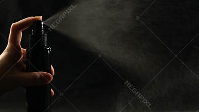 Hand spraying aerosol, concept of damage of Earth ozone layer, climate change