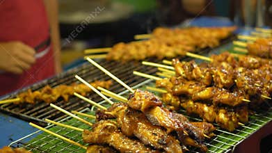 Street food in Asia. traditional dishes of street cuisine. night food markets