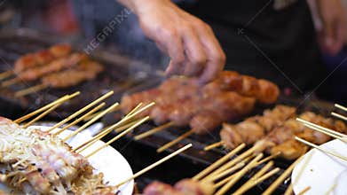 Street food in Asia. traditional dishes of street cuisine. night food markets